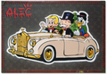 $ Team Driving Gold Car with $ Bags Trunk