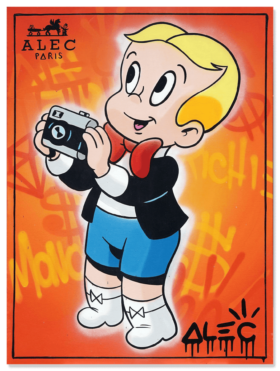 Orange Richie Holding Camera Up