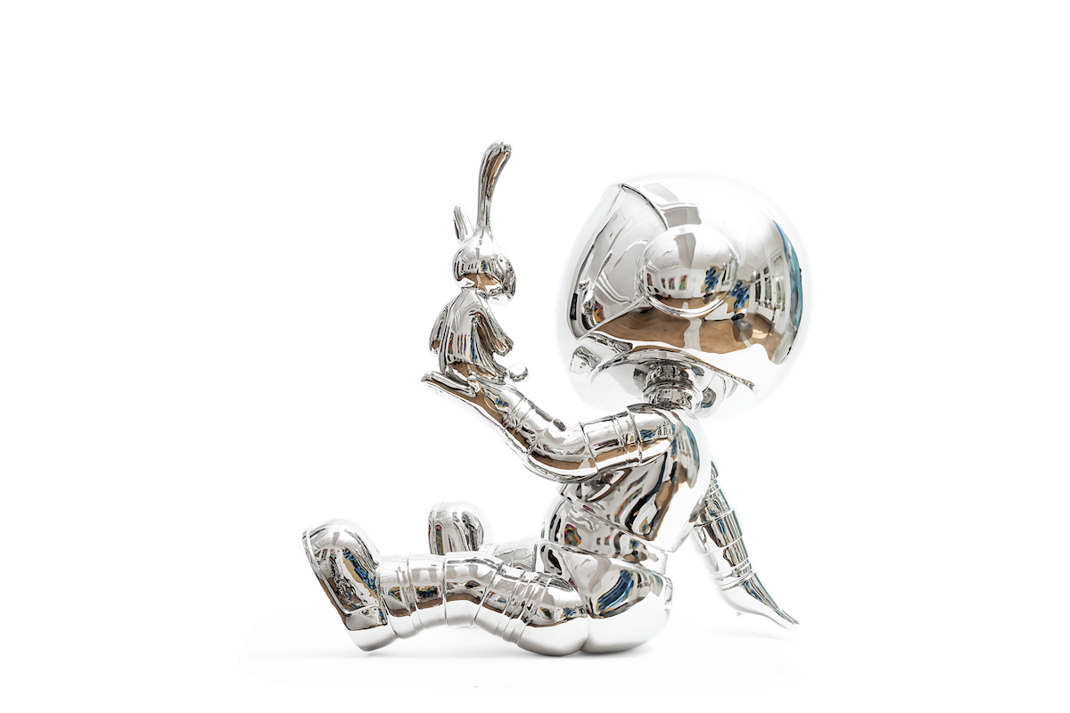 Astronaut Sitting on Floor with Rabbit